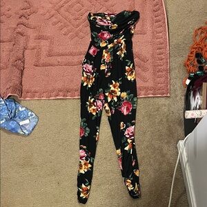 Floral Black Jumpsuit. Worn once for a wedding. Like new condition.
